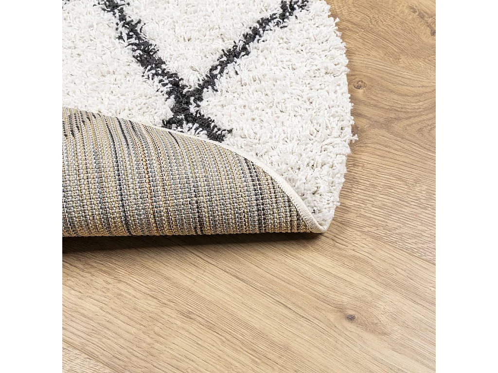 Alfombra de pelo largo moderna PAMPLONA crema y negro Ø 100 cm