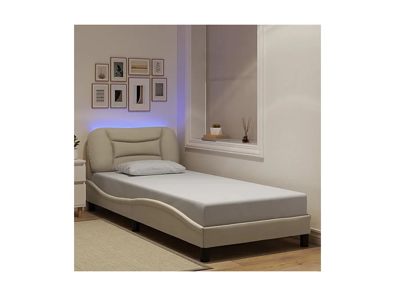 Cadre de lit avec lumières LED crème 90x190 cm tissu