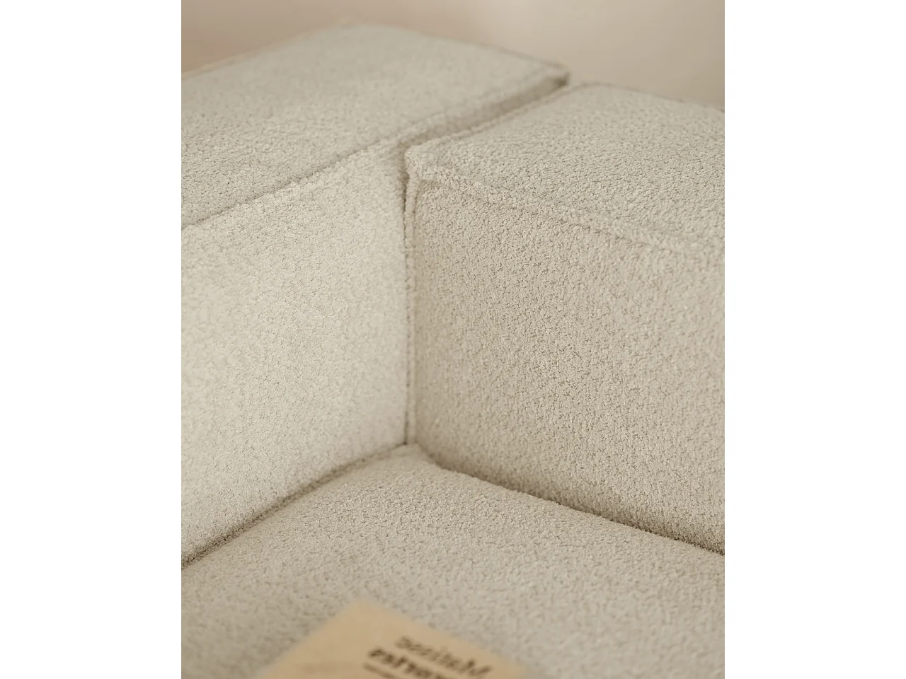 Canapé d'angle droit 4 places en bouclé couleur gris clair 300x175cm