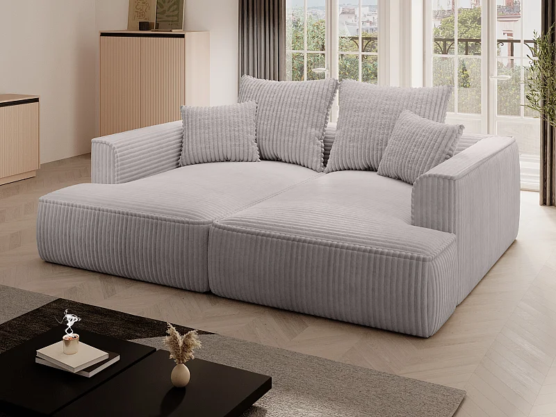 Comfortabele driezitsbank met diepe zitting van lichtgrijs ribfluweel met brede ribbels PINETA