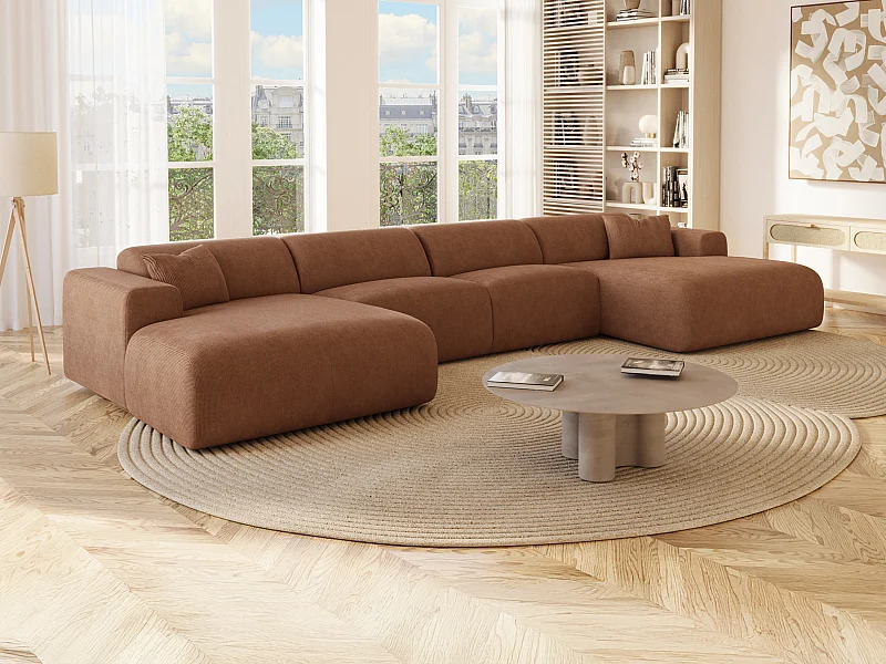 Stor panoramisk hjørnesofa i terracotta-ribbet stof POGNI fra Maison Céphy