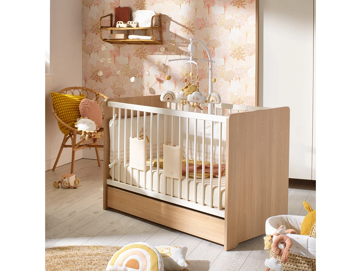 Cuna de 120 x 60 con cabeceros redondeados de madera decorada en roble miel