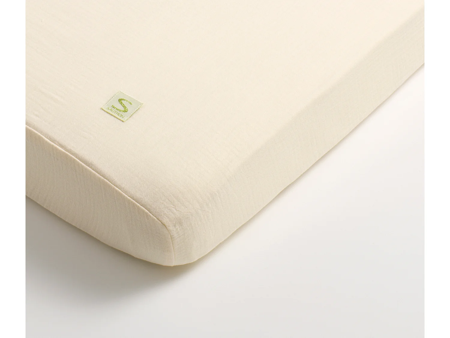 Draps housse bébé en coton bio UNI VANILLA - Sauthon