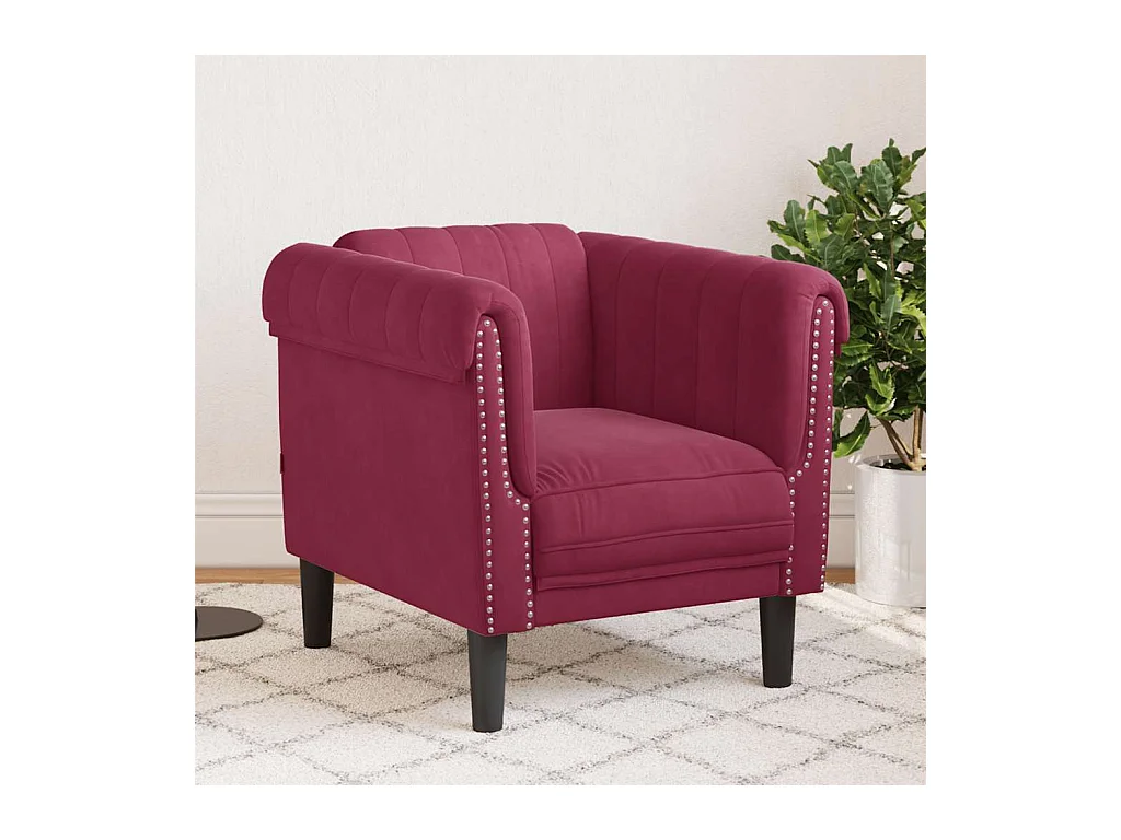 Sillón de terciopelo rojo tinto