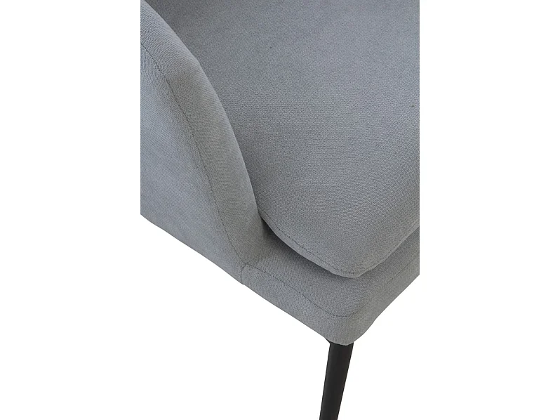 Fauteuil tapissé gris perle avec coussin et pieds en métal noir