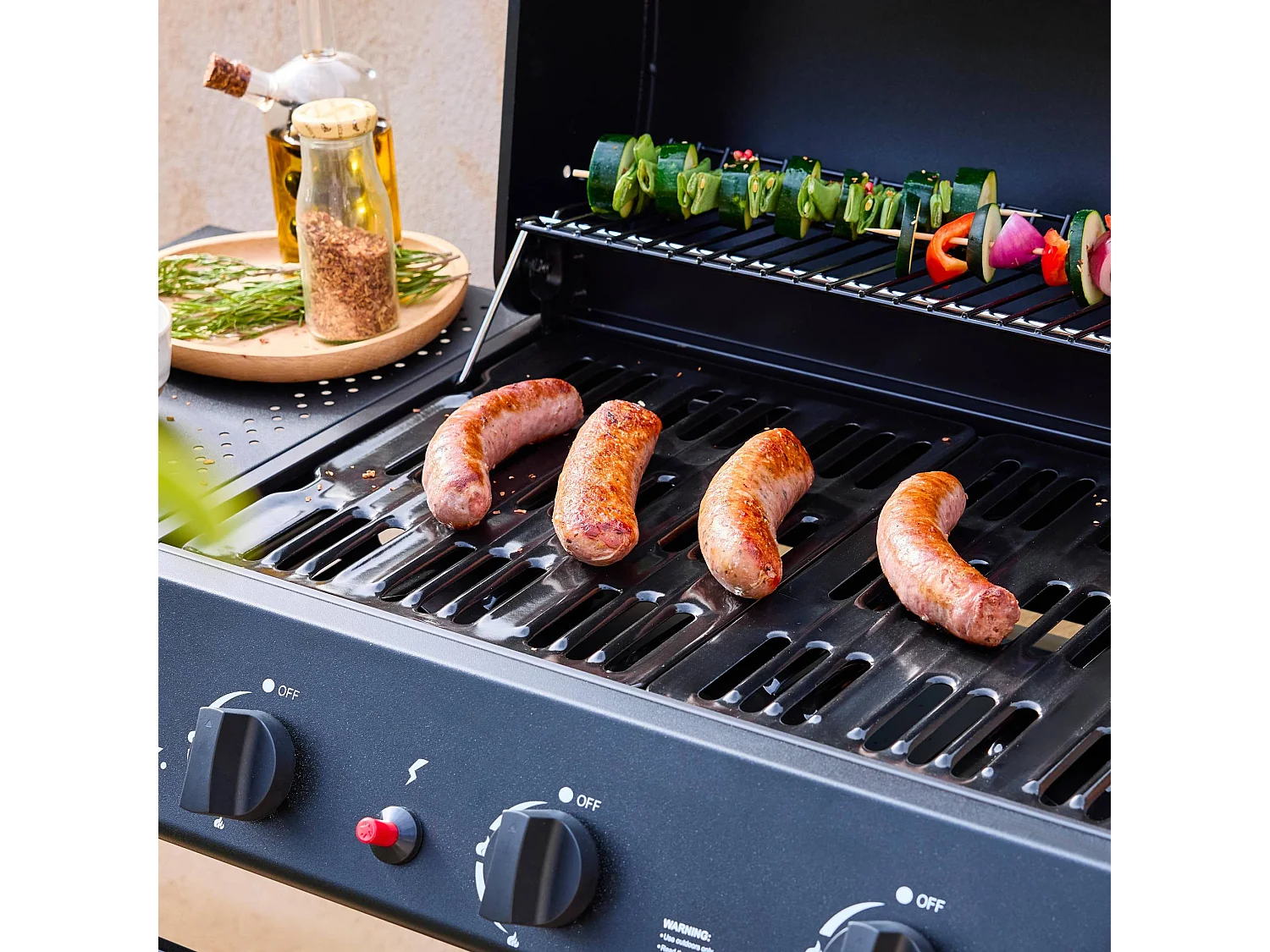 Barbecue au gaz Madeleine noir. 3 brûleurs. cuisine extérieure. L 109.5 x P 59 x H 125cm