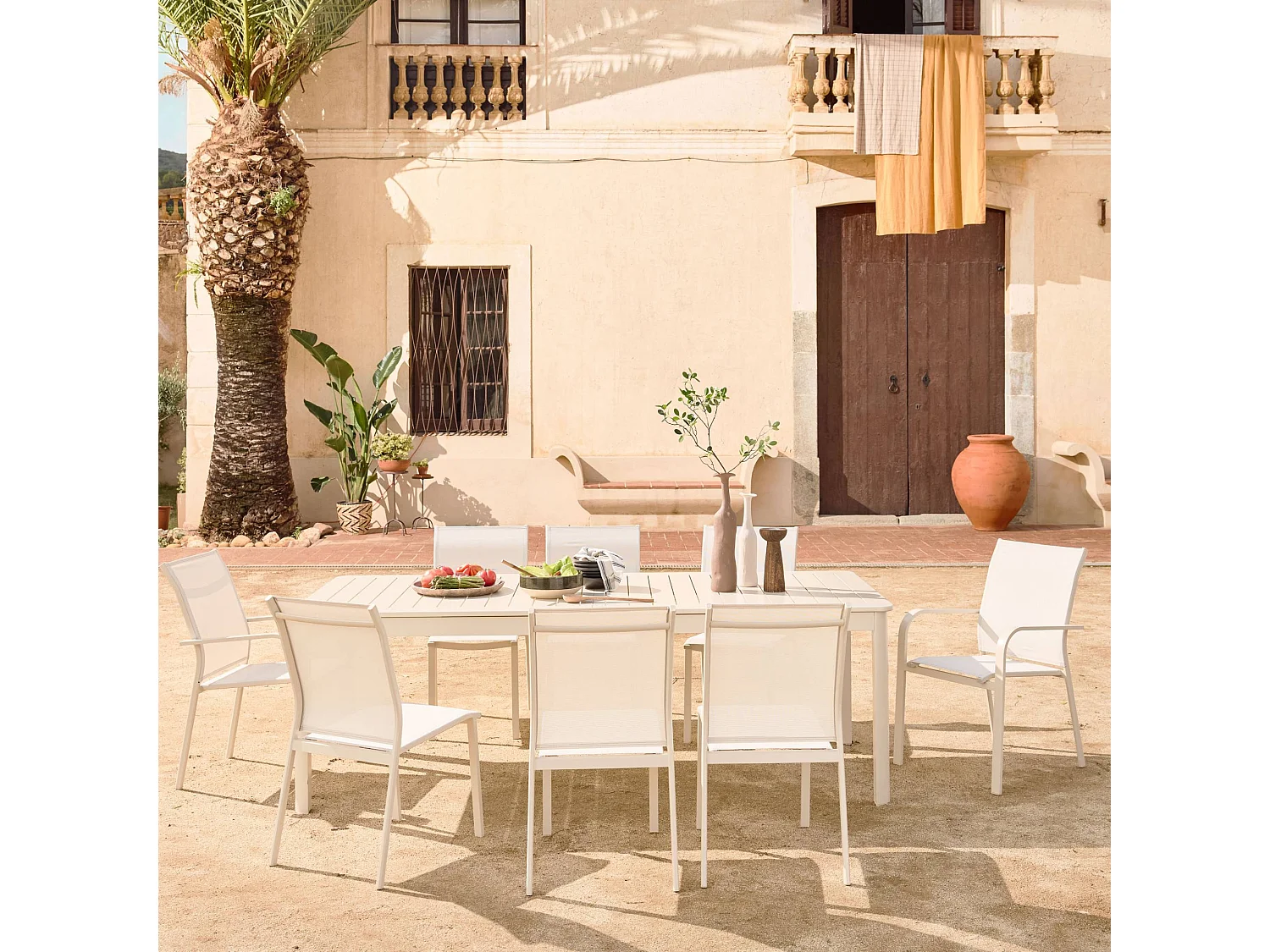 Mesa de jardín extensible de aluminio con 10 sillas beige