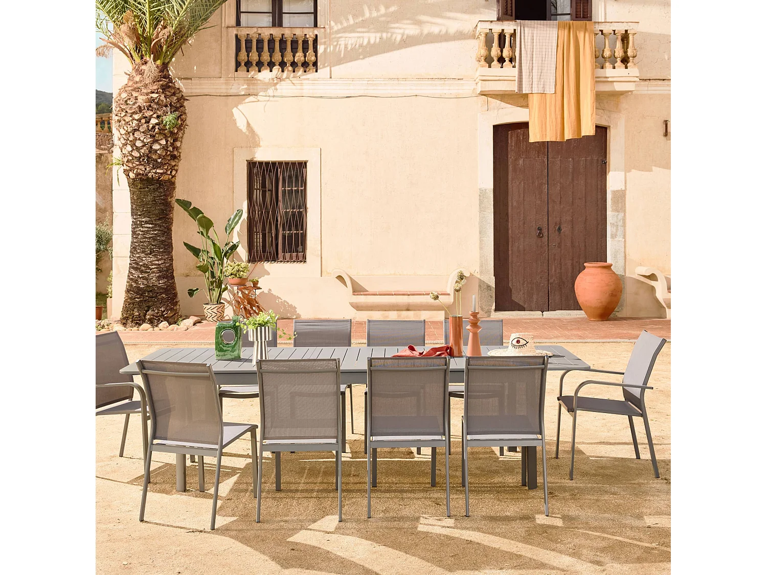 Set tavolo allungabile in alluminio con 8 sedie e 2 poltrone,