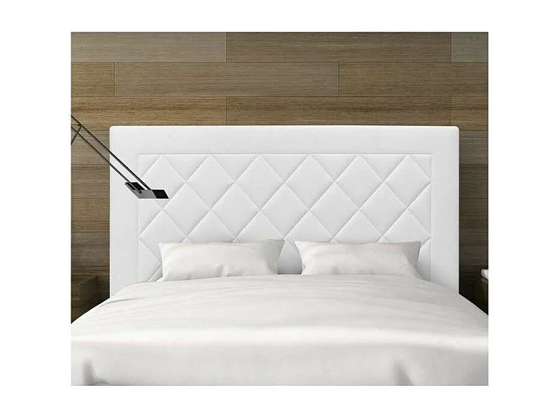 Cabecero Romo tapizado en polipiel blanco. 130 cm (alto), 145 cm (ancho), 7 cm (fondo).
