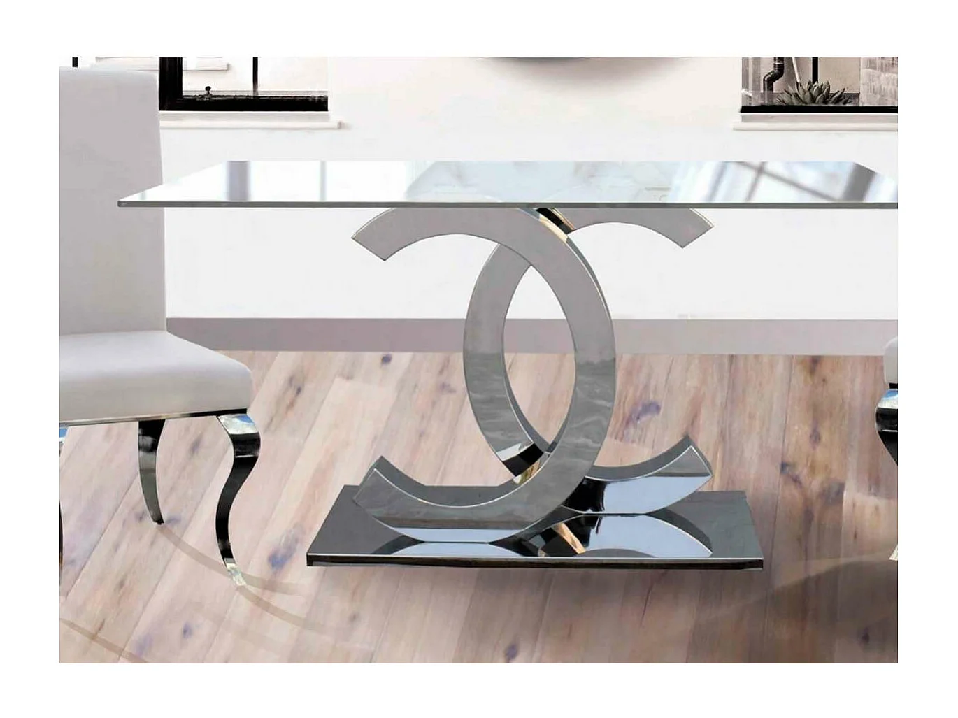 Mesa comedor Chanel de 150 cm de largo con acabado cromado.