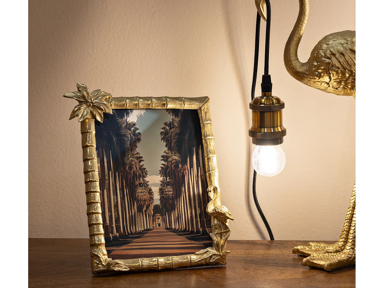 Cornice in resina dorata con palma cm 25x2,8x21