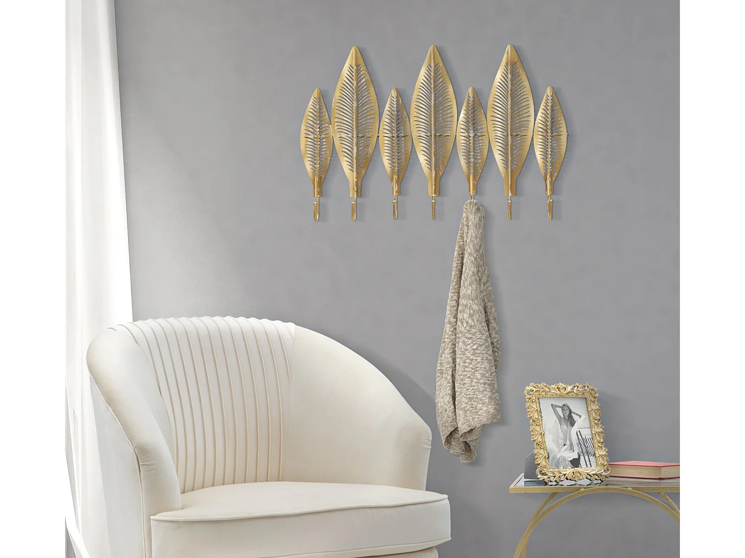 Cintre en feuilles de métal doré avec 7 crochets 65x42,5x6 cm