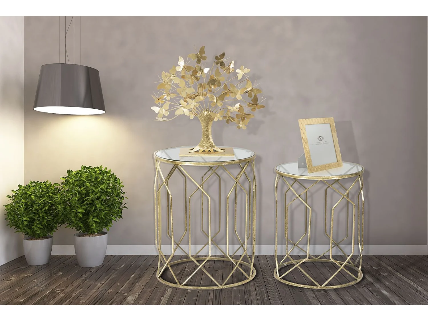 Set di 2 tavolinetti in metallo dorati con vetro Ø cm 42x53-38x47