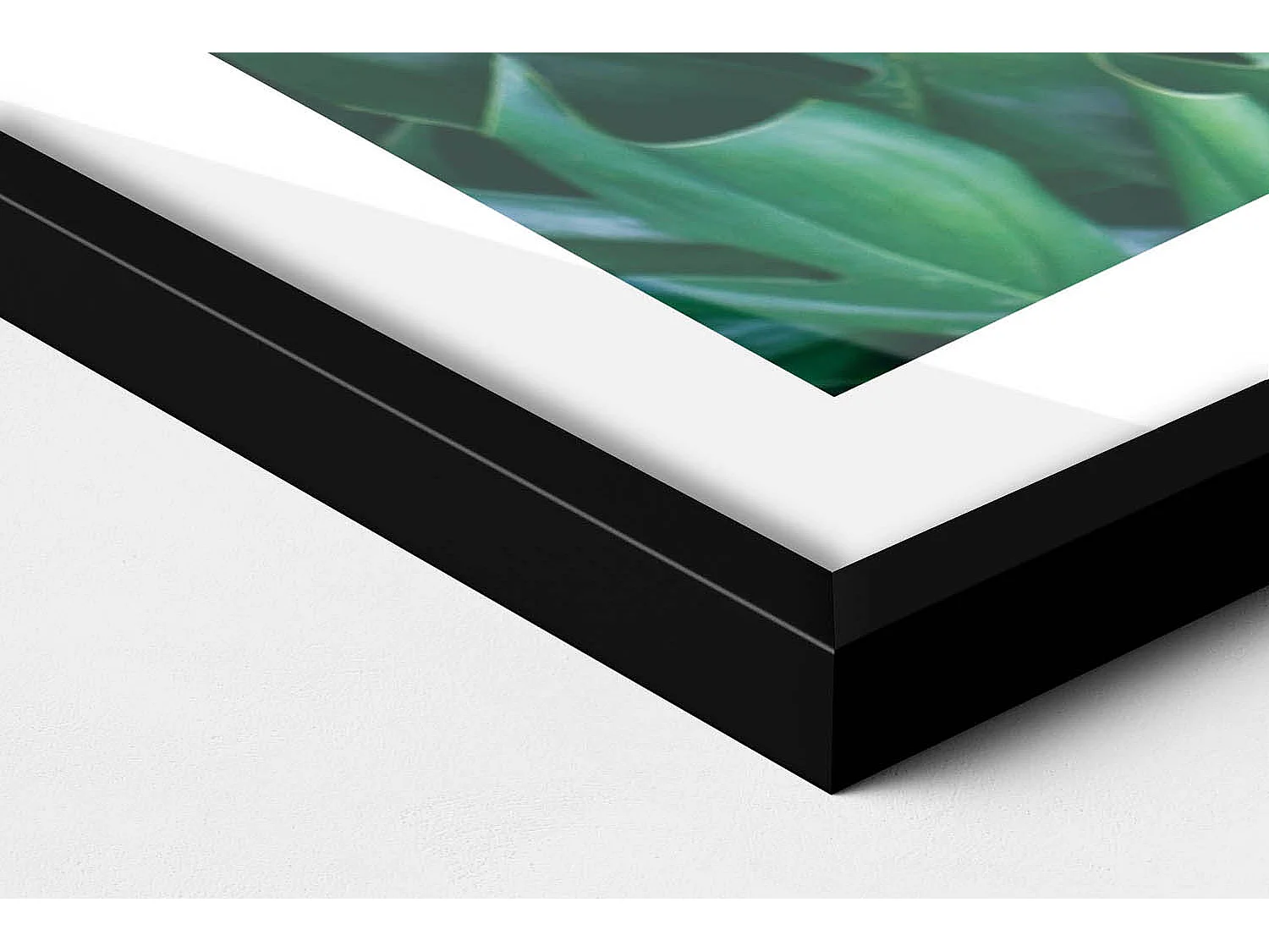 Dekoratives Gemälde mit schwarzem Rahmen, Tropische Natur – Monstera-Blätter 100 x 70 cm – Perfekt für das Wohn- oder Schlafzimmer