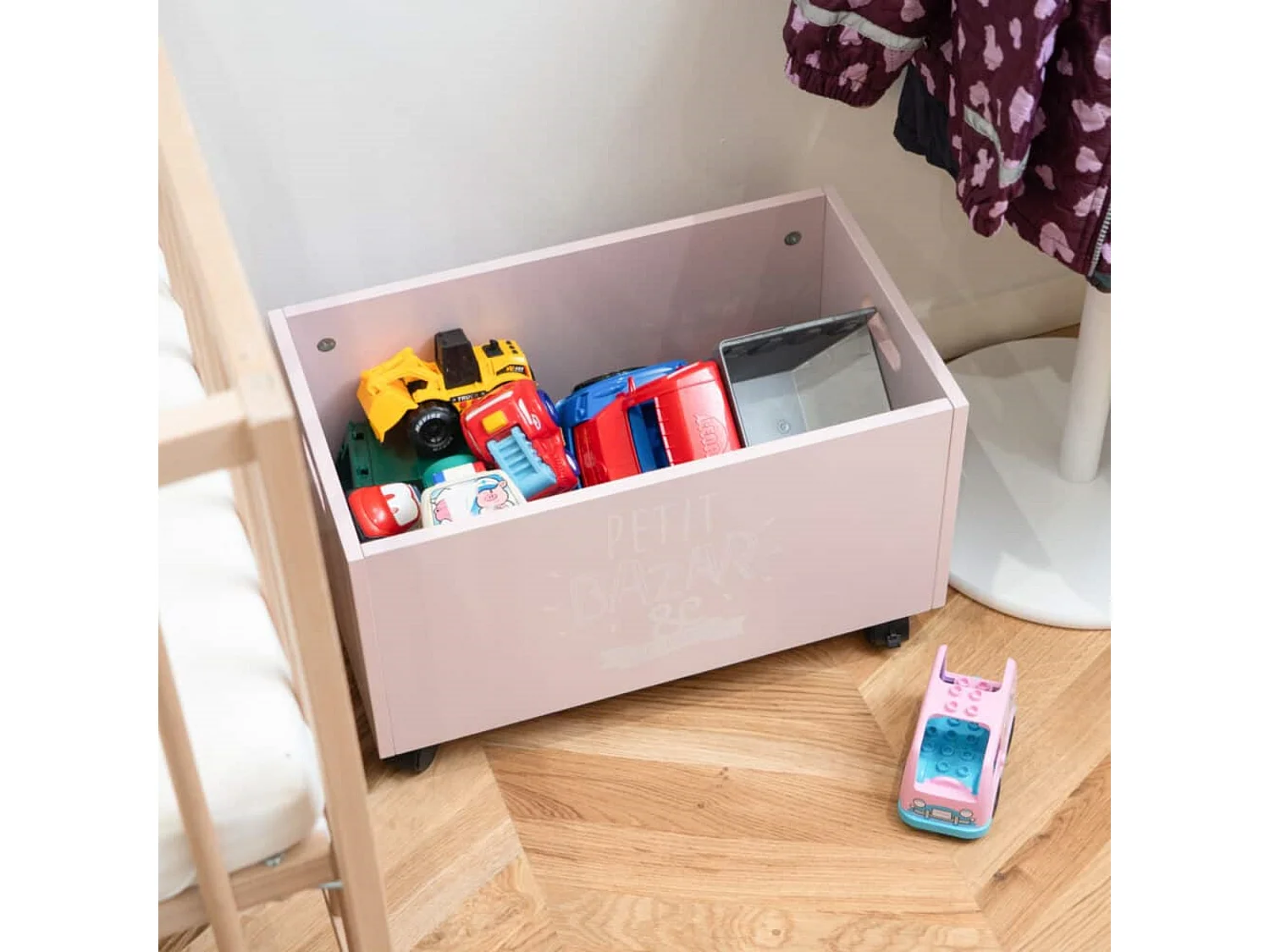 WELL HOME - Malle portagiochi rose avec ruote en MDF 48x28x28,5 cm