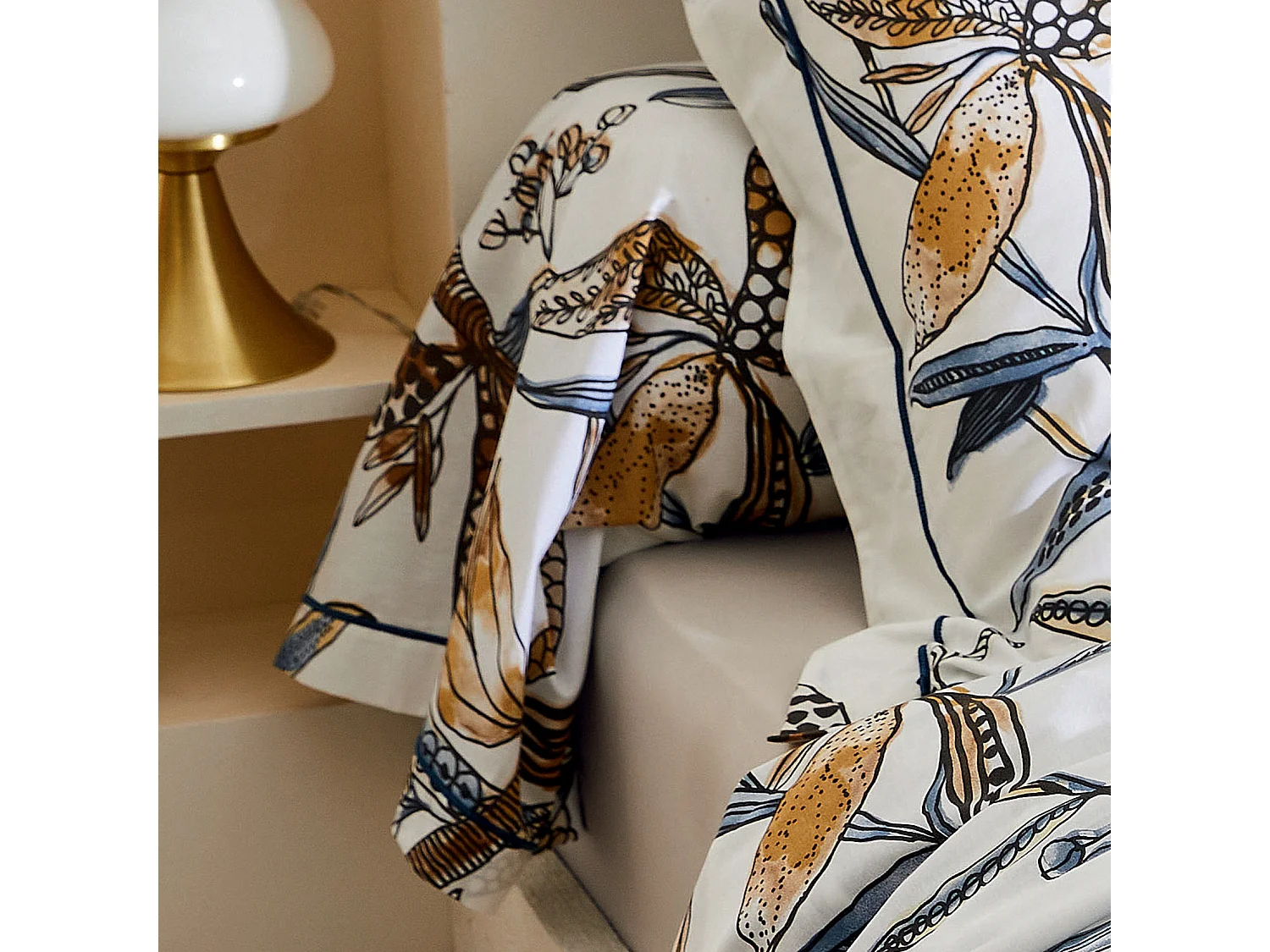 Taie de traversin aux fleurs exubérantes