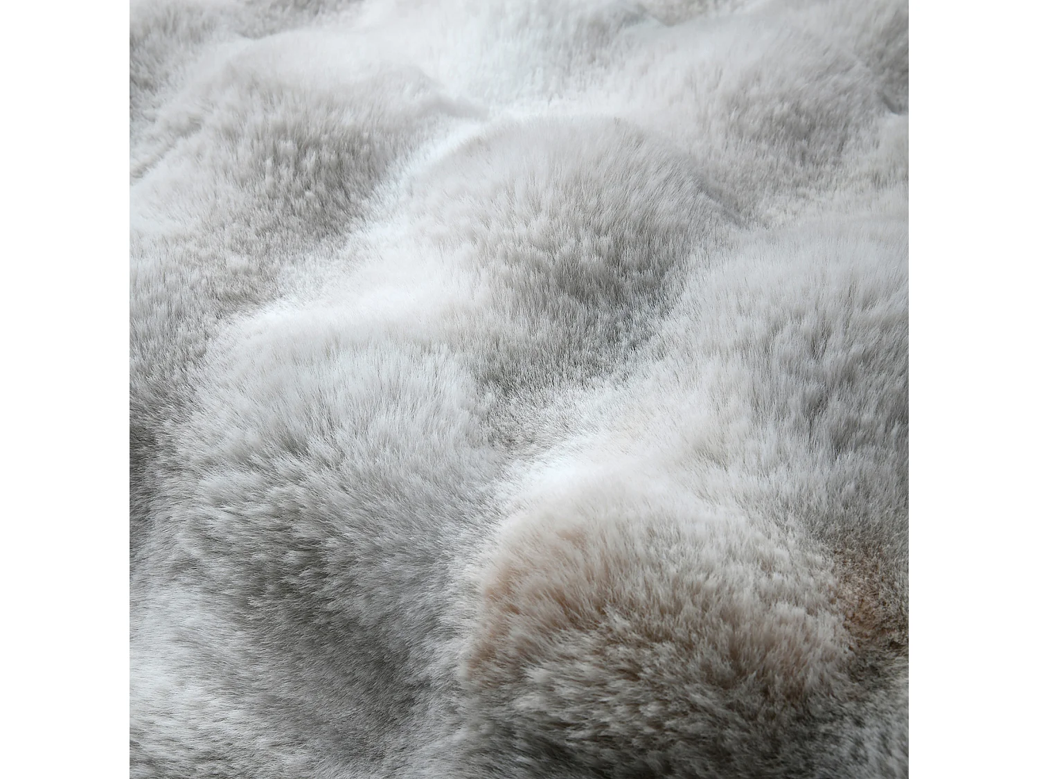 Coussin déhoussable imitation fourrure