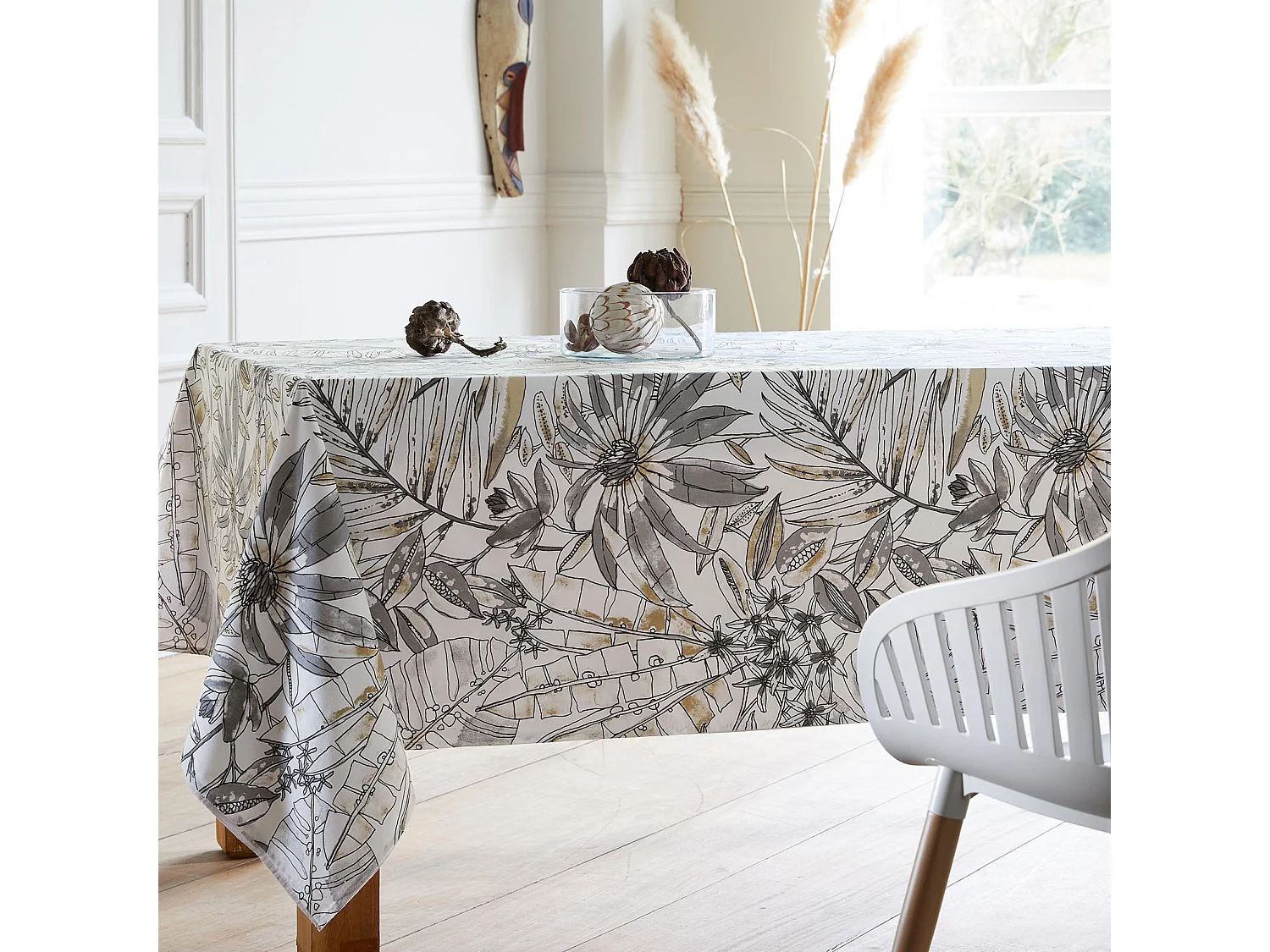 Mantel redondo plastificado con estampado floral