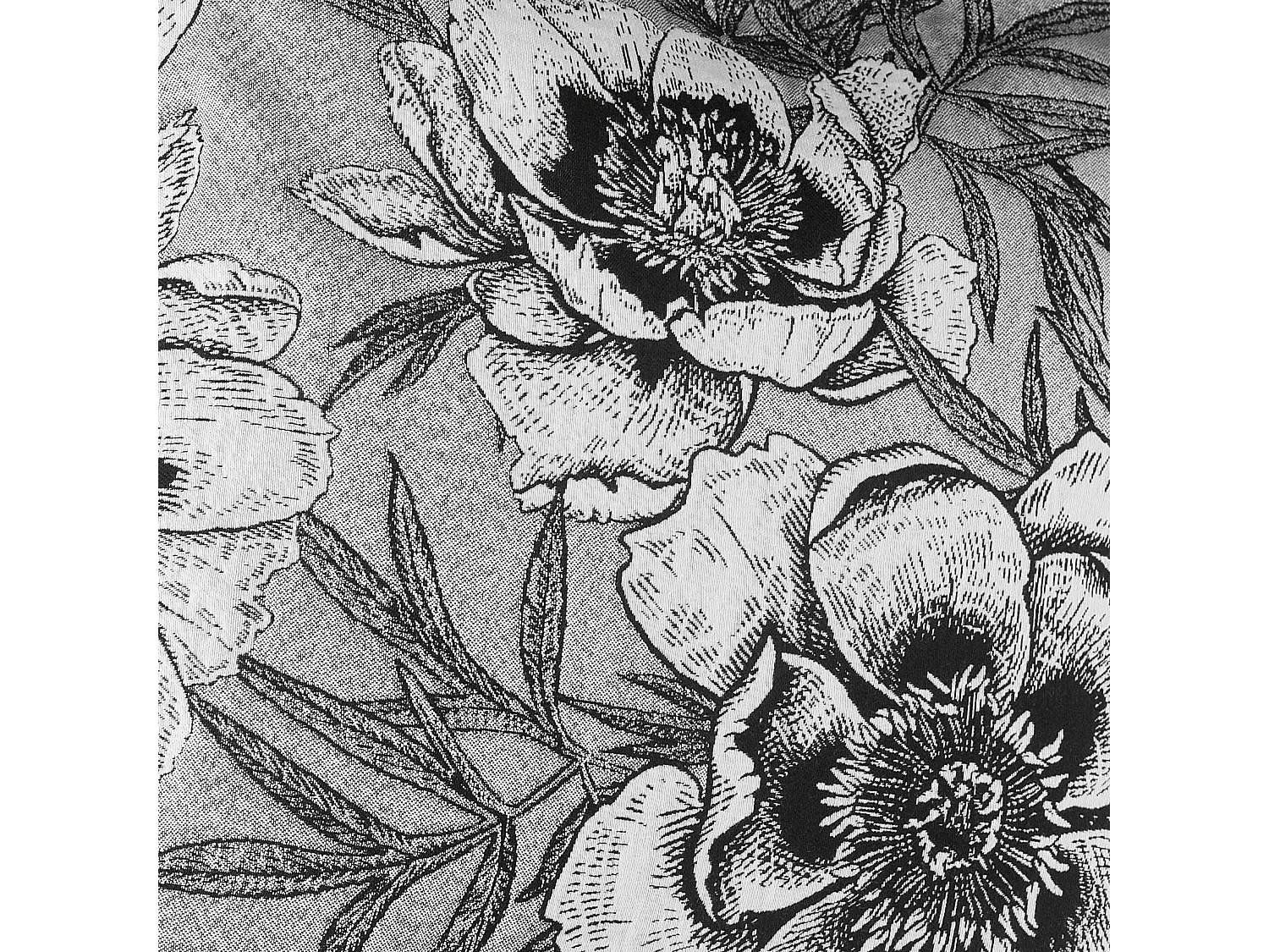 Coussin passepoilé aux impressions florales