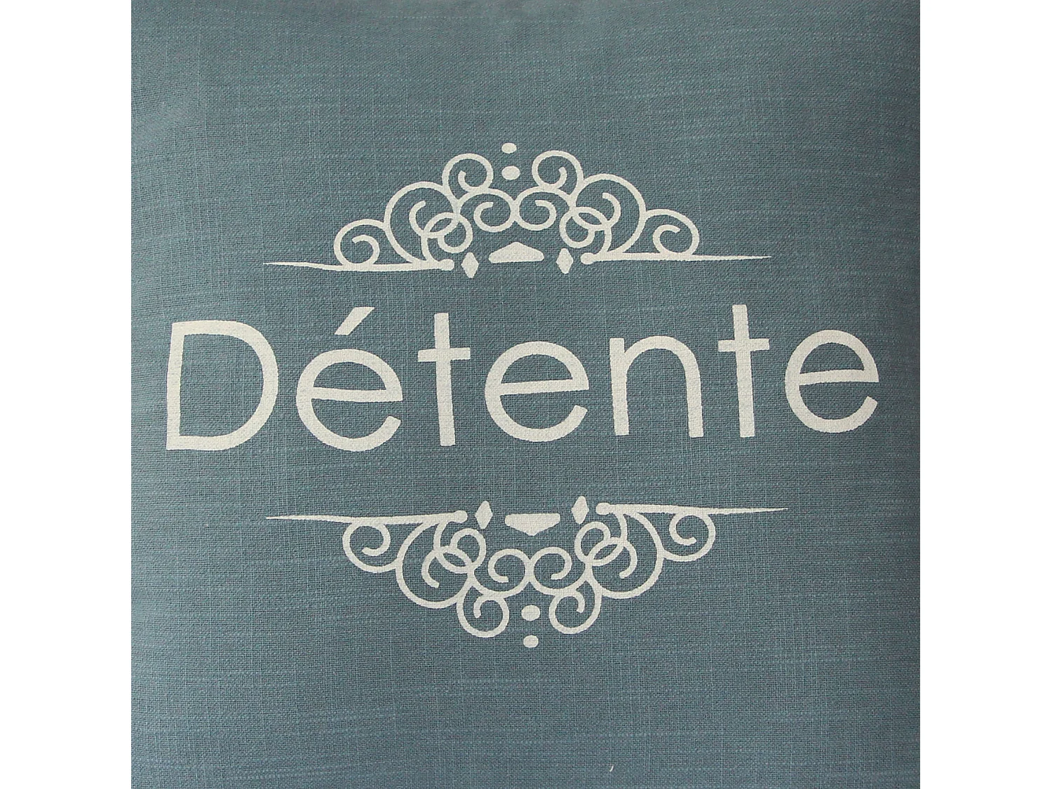 Coussin déhoussable et passepoilé