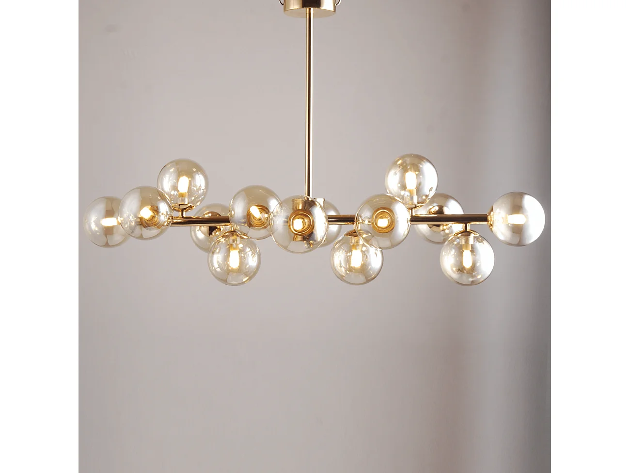 Lustre design doré chaleureux à 14 sphères - Osanna