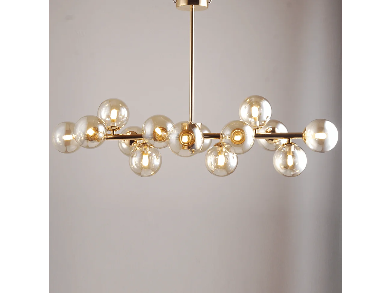 Lustre design doré chaleureux à 14 sphères - Osanna
