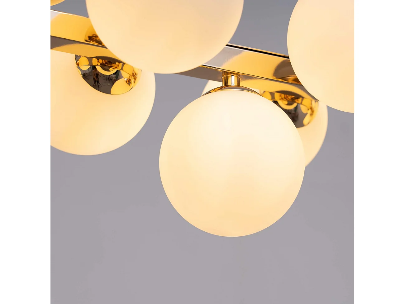 Suspension horizontale dorée à sphères en verre blanc - Ambrosia