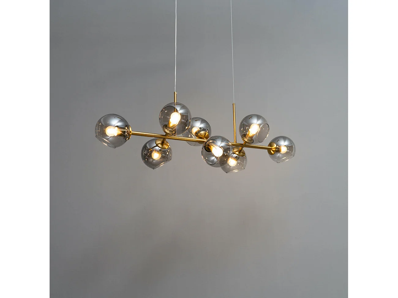 Grande suspension horizontale 8 sphères en verre fumé - Carlotta