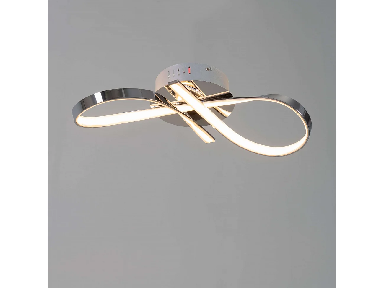 Plafonnier LED dimmable design ruban infini chromé - Acht