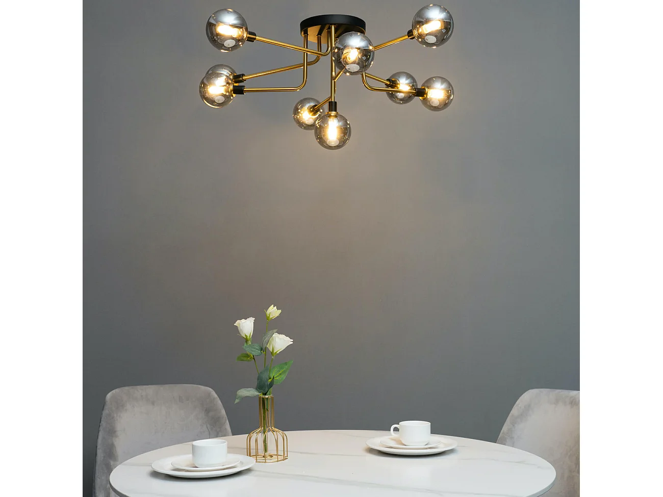 Plafonnier moderne noir et doré 9 boules en verre ambré - Merano