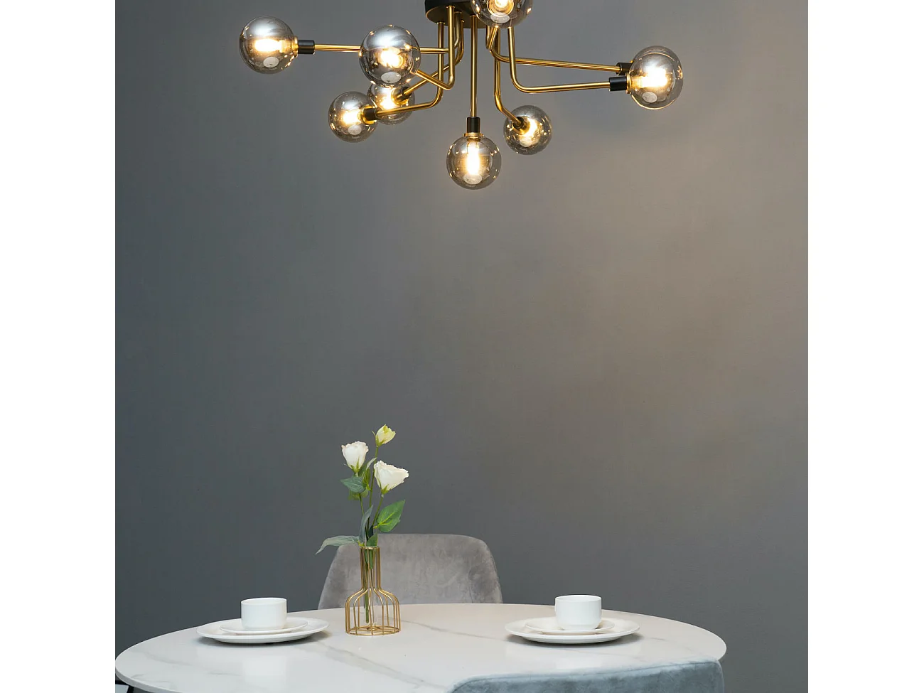 Plafonnier moderne noir et doré 9 boules en verre ambré - Merano