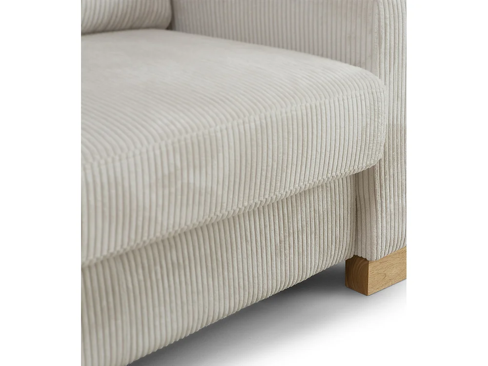 Sofá de 3 plazas de 85x188x78 cm de tela símil pana en color beige y patas de madera Luz