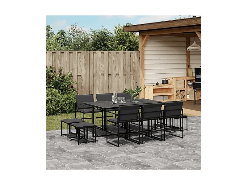 Juego de comedor de jardín 11 piezas con cojines textileno negro