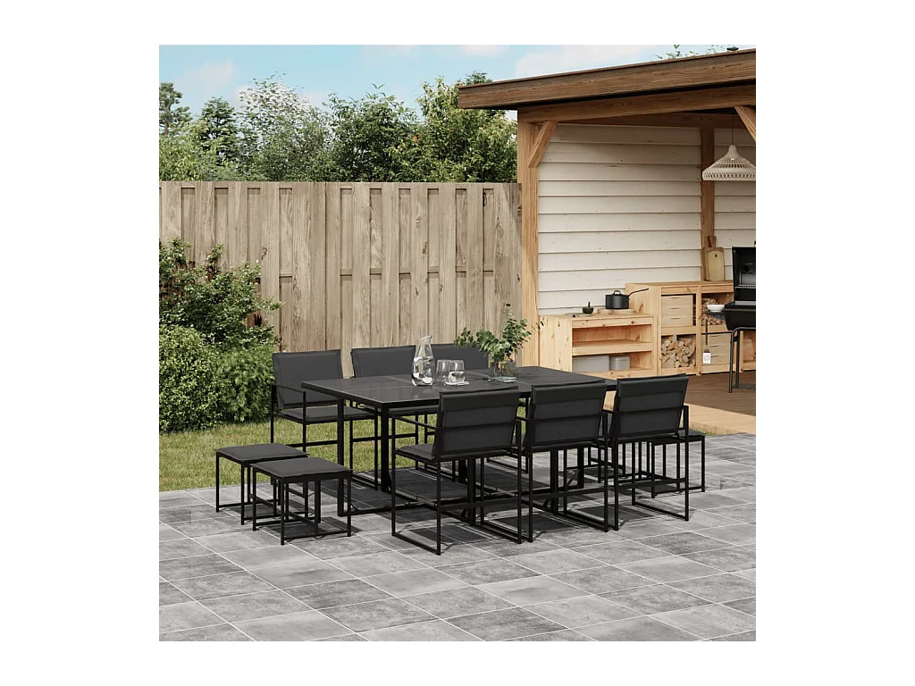 Juego de comedor de jardín 11 piezas con cojines textileno negro