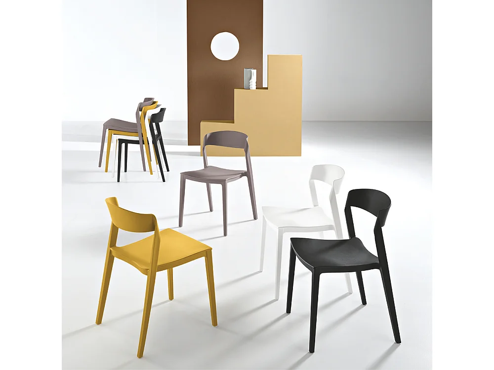 Conjunto de 2 sillas modernas apilables amarillas "Quorathis" en polipropileno para comedor cm 49x52 77h