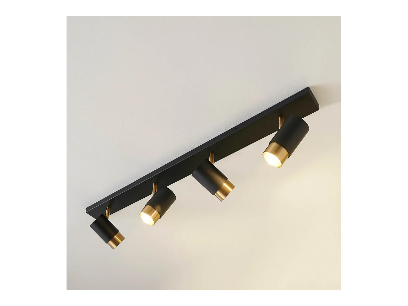 Plafonnier moderne 4 projecteurs orientables noirs et dorés - Pozzo