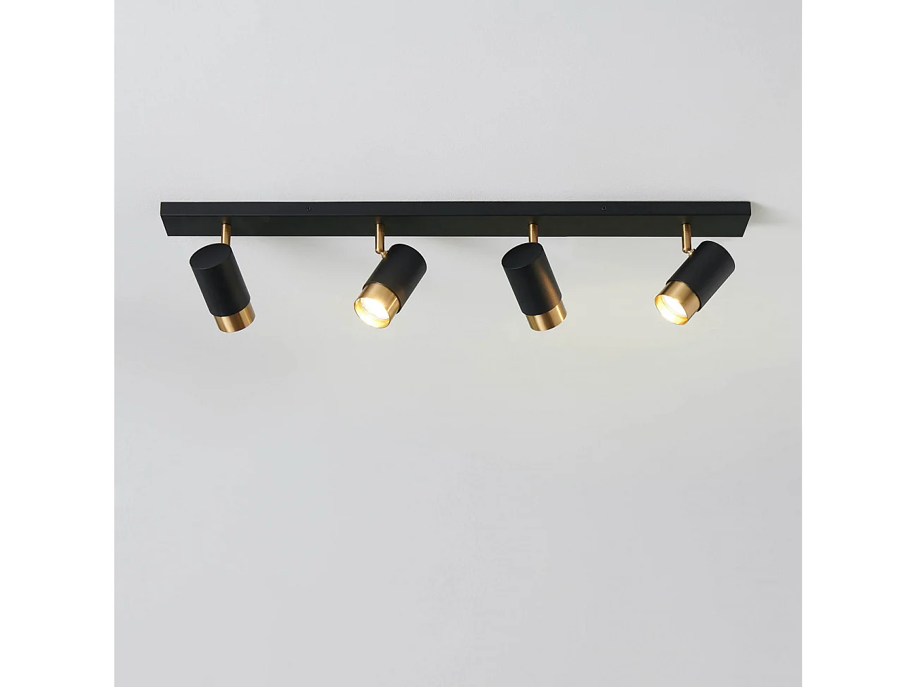 Plafonnier moderne 4 projecteurs orientables noirs et dorés - Pozzo