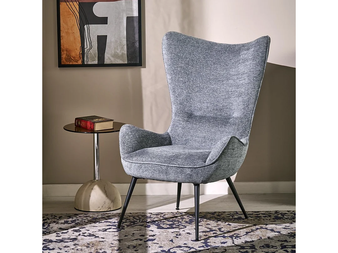 Sillón de diseño en tejido gris con patas de metal negro Baralona