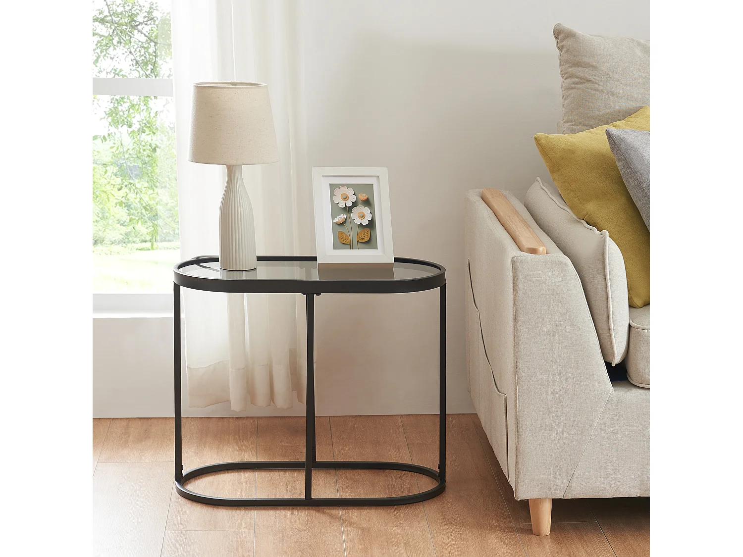 Table d'appoint Luleå avec plateau ovale métal verre trempé 55 x 28 x 45 cm noir [en.casa]