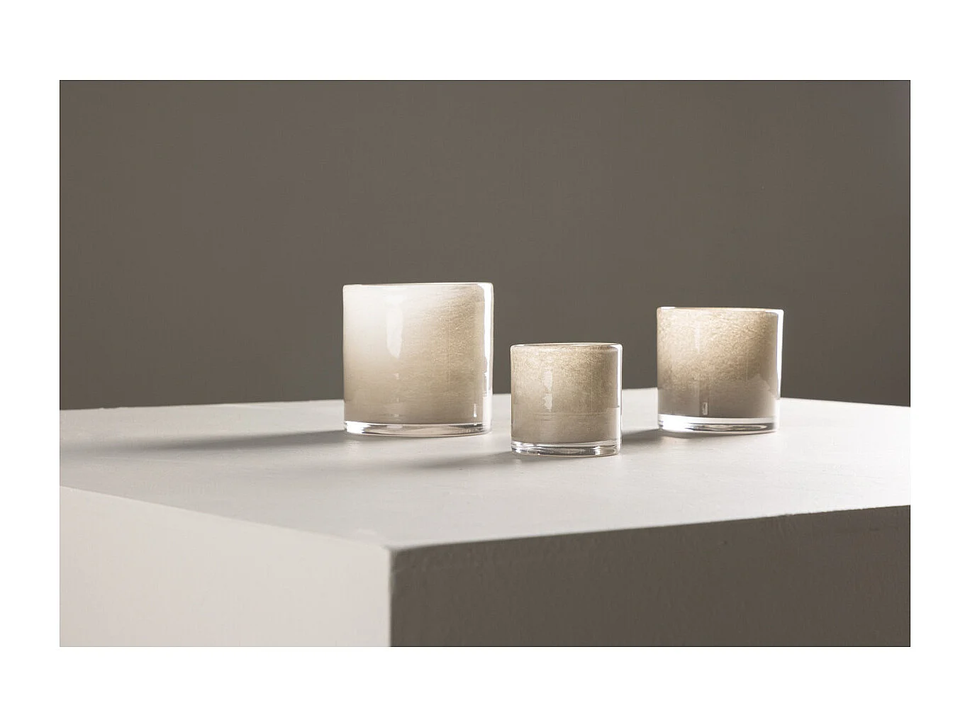 Glora waxinelichthouder beige.