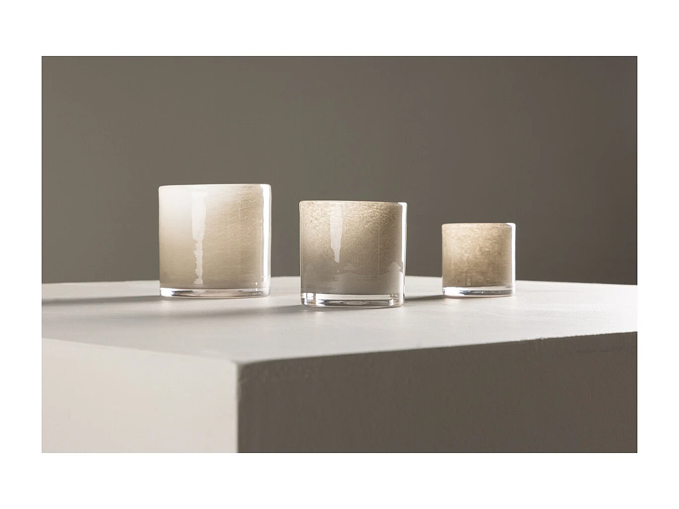 Glora waxinelichthouder beige.