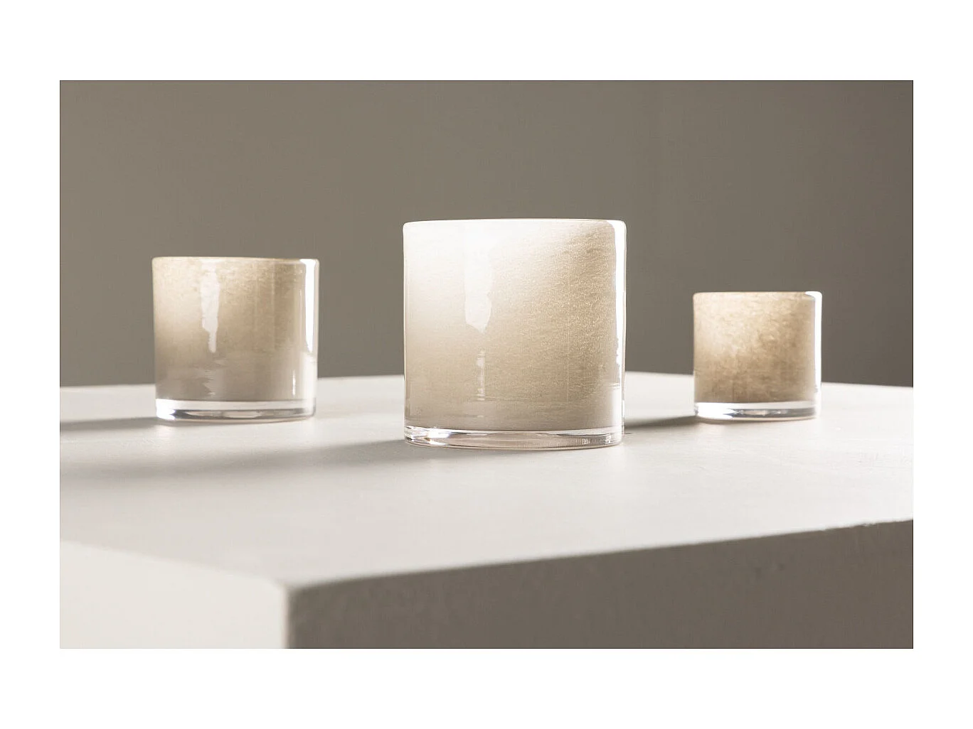 Glora waxinelichthouder beige.