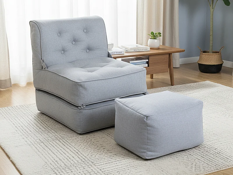 Fauteuil convertible chauffeuse avec repose-pieds en tissu gris clair ZONIRA