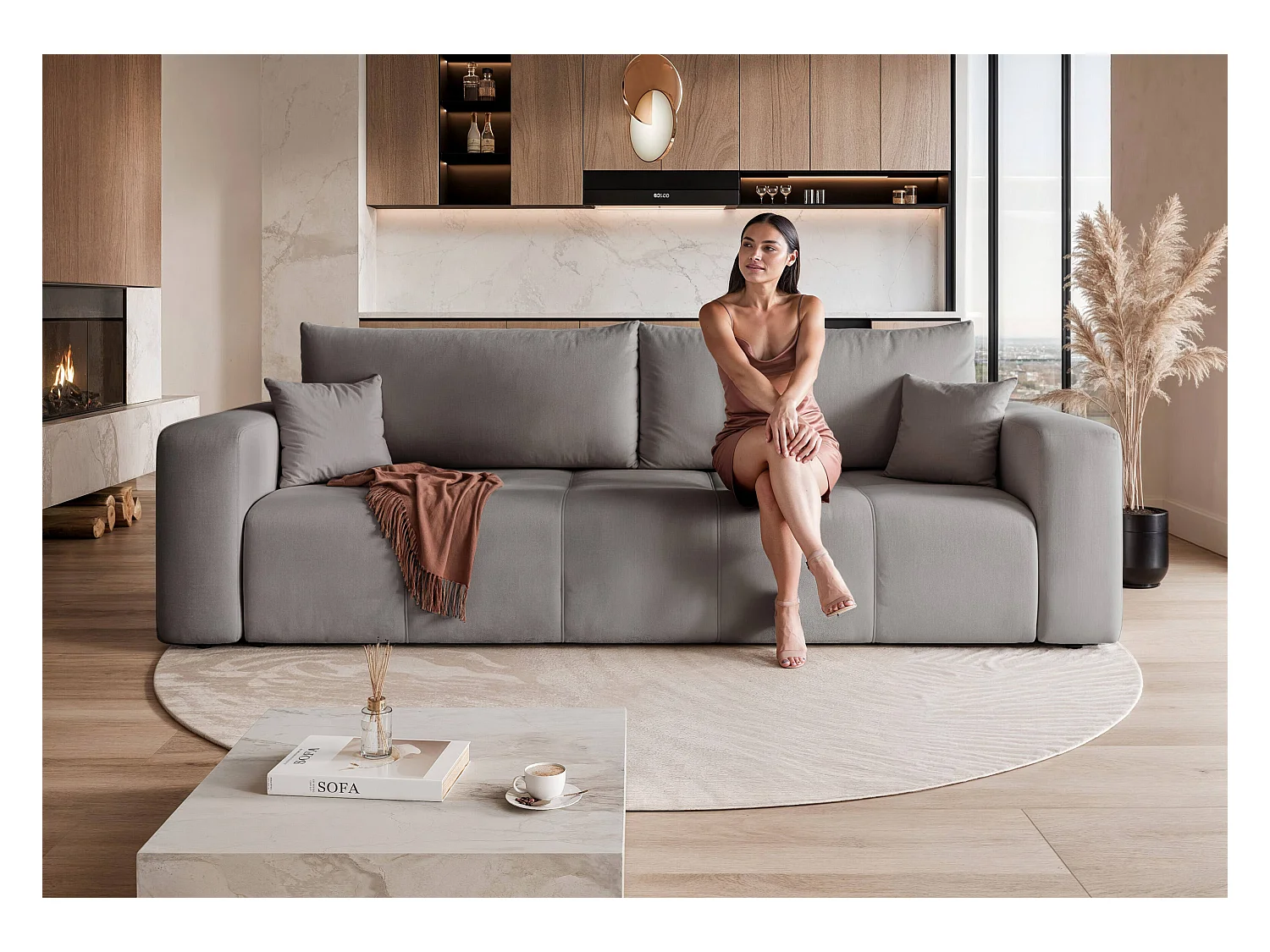 Canapé convertible en tissu gris