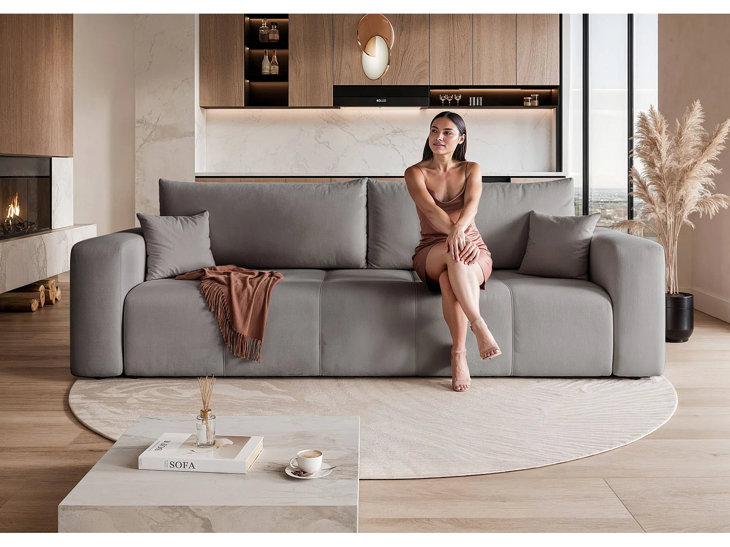 Canapé convertible en tissu gris