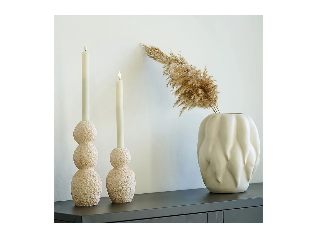 Juego de 2 portavelas de cemento.