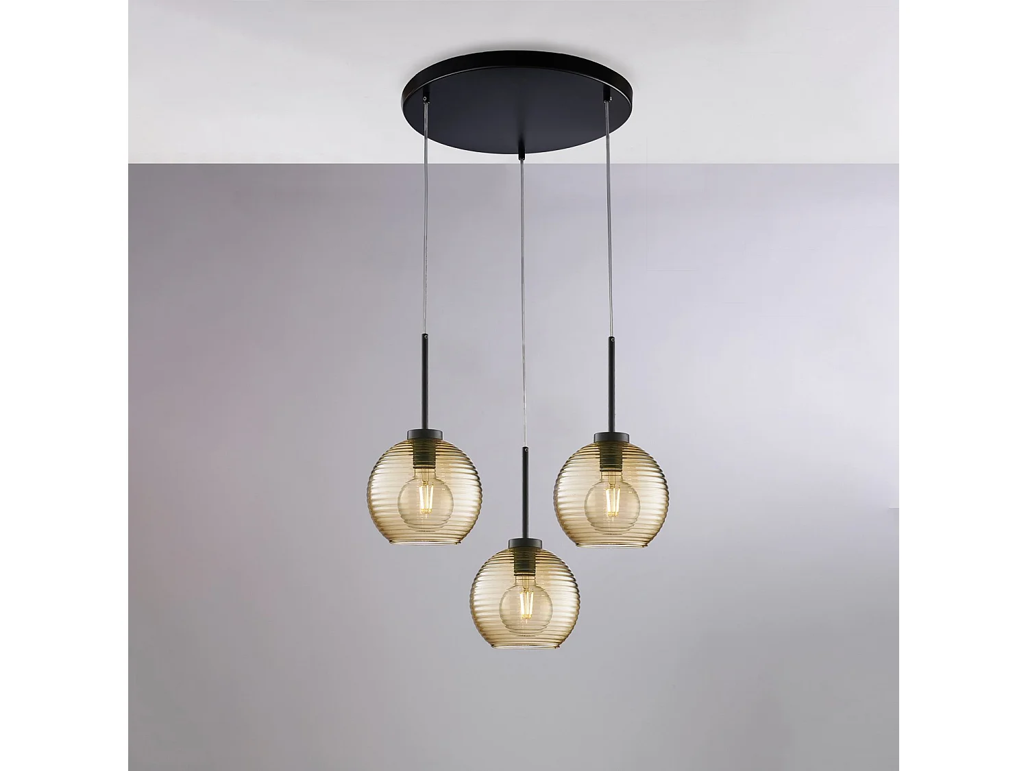 Ankara Suspension lamp in black lacquered iron with adjustable electric cables and amber blown glass diffusers with relief stripes 3 lights 141 Ø47