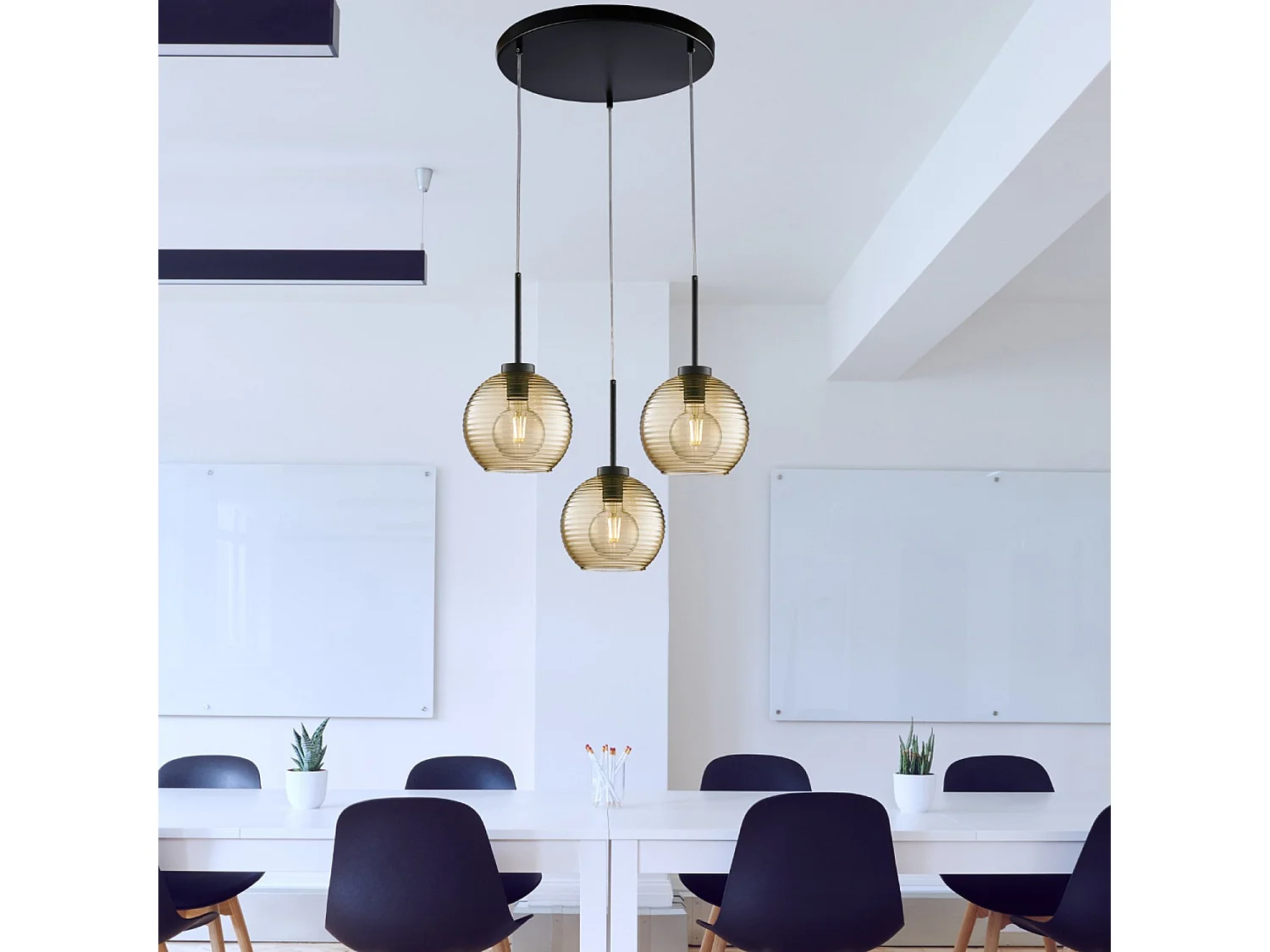Ankara Suspension lamp in black lacquered iron with adjustable electric cables and amber blown glass diffusers with relief stripes 3 lights 141 Ø47