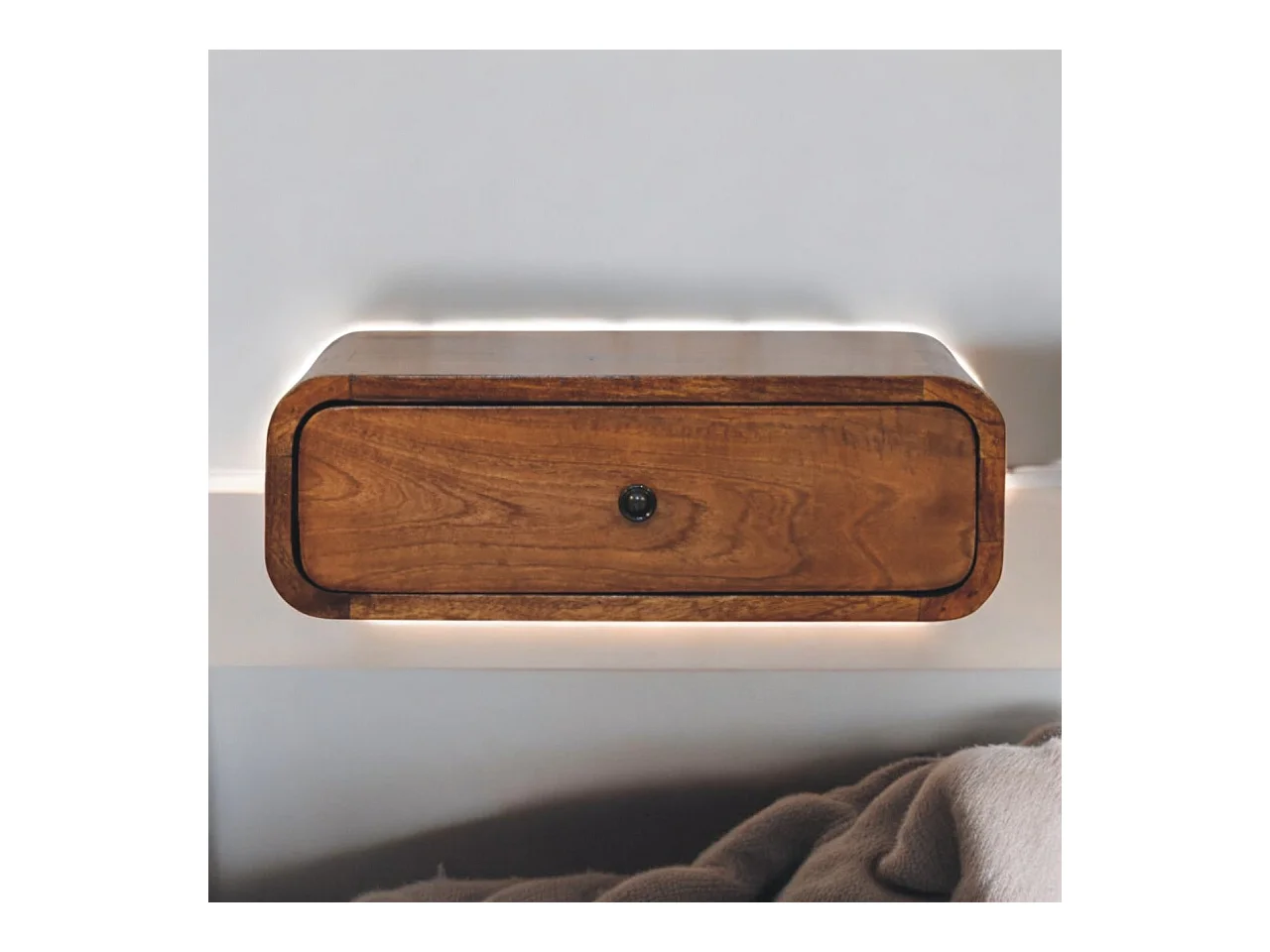 Artisan Furniture Szafka nocna Avora montowana na ścianie z 1 szufladą w kolorze miodowo-karmelowym z litego drewna