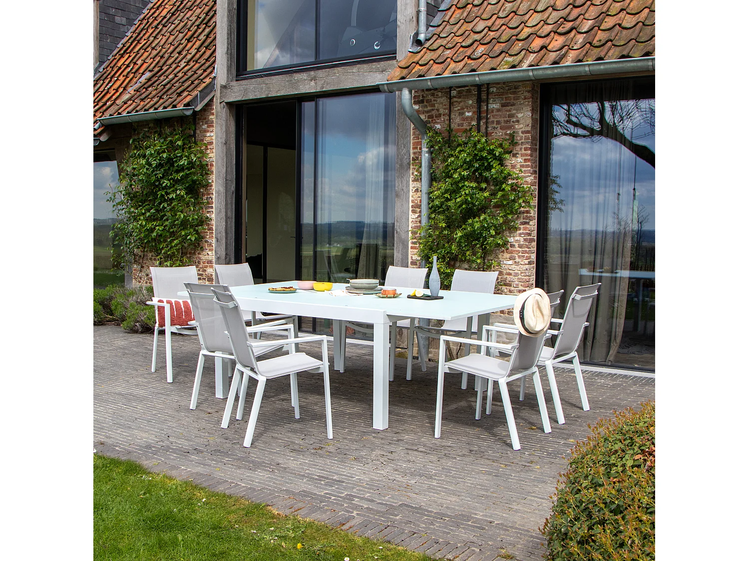 Ensemble WHITESTAR 8/12p en aluminium blanc et verre blanc avec 8 fauteuils en textilène